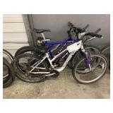 LOT WITH 3 BICYCLES: WHITE SCHWINN, BLUE GT, PURPL LOT WITH 3 BICYCLES: WHITE SCHWINN, BLUE GT, PURPL