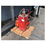 PALLET WITH 30 GAL BIDIRECTIONAL HAND OIL PUMP &