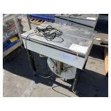 AUTOMATIC STRAPPING MACHINE
