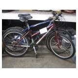1 TREK & 1 RALEIGH MOUNTAIN BIKE