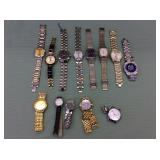 1 BAG WITH GOLD/SILVER TONE WATCHES