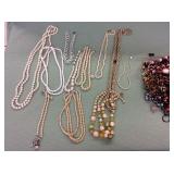 1 BAG WITH MIXED JEWELRY