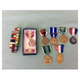 1 BAG WITH MILITARY MEDALS