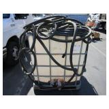 TOTE TANK WITH TWO PUMPS & HOSE APPROXIMATELY  1,0