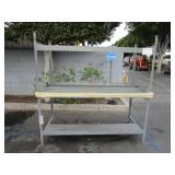 TWO WORKING STATION METAL TABLES.