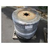 PALLET OF FOUR USED SKIT LOADER TIRES.