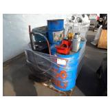 PALLET OF DRUMS OF OIL AND HAND CRANK PUMPS