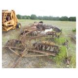 PILE OF VINTAGE FARM EQUIPMENT