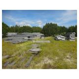 LARGE PILE OF PRE BUILT CONCRETE FORMS