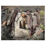 CONCRETE PALLET WITH VINTAGE FARM SUPPLIES