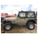 2002 Jeep Salvage Ca. Title KEY