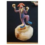 Ron Lee clown on skateboard with bunny