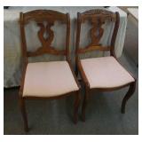 Pair of Rosewood padded xmchairs