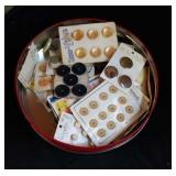 Tin of vintage buttons