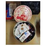 Vintage tin of buttons