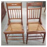 Pair of oak Cain bottom chairs