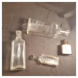 4 vintage bottles