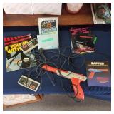 Nintendo controllers,  zapper, & brochures