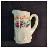 Custard Glass souvenir pitcher of Sabetha, Kansas