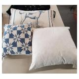 3 assorted pillows, 1 with tags