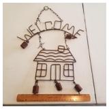 Welcome sign with bells