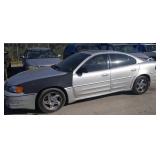 2004 PONTIAC GRAND AM 4 DOOR SILVER