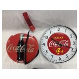 Coca Cola memorabilia (phone and a clock)
