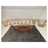 Pink colored floral designed glass cups a