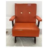 Small orange rocking chair