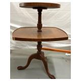 Small light colored wooden 2 tier table