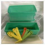 Vintage green Tupperware containers and m