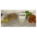 Vintage Measuring cups and Tupperware bowls and a