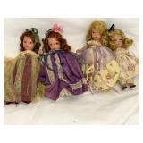 (4) storybook dolls