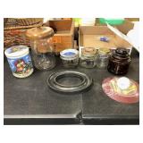 Empty candle jars and Mac Donaldï¿½s golf tee set