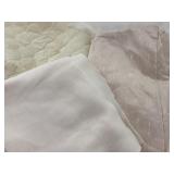 Cream colored material, assorted size pieces