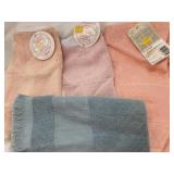 Baby bibs and tea towels for cross stitch crafts