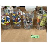 (2) Smurf cups  and Mickey Mouse cup and shrek