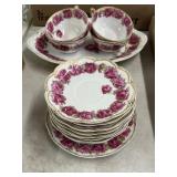 One serving dish, 4 cups eight small plates, one