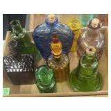 Assortment of different color decanters
