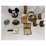Coin purse compact mirrors  pocket ashtrays and a