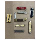 Eight vintage advertising pocket knife