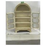 Trinket display case with clear glass windows on
