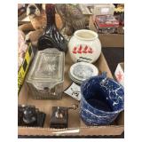 Pencil sharpener, glass boxes, mug, and a Canter