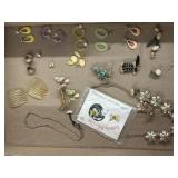 Earrings, roaches, necklaces, hair pins , and