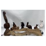 Carved Pelicans quails flamingos and driftwood