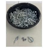 Oil pan full of  nuts bolts and hitchpins