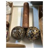 2 decorative spheres and an incense holder
