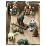 Stoneware figurines and wooden