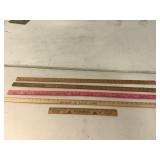 4 yard sticks and a ruler