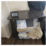 Shelf unit w/ blankets & clock